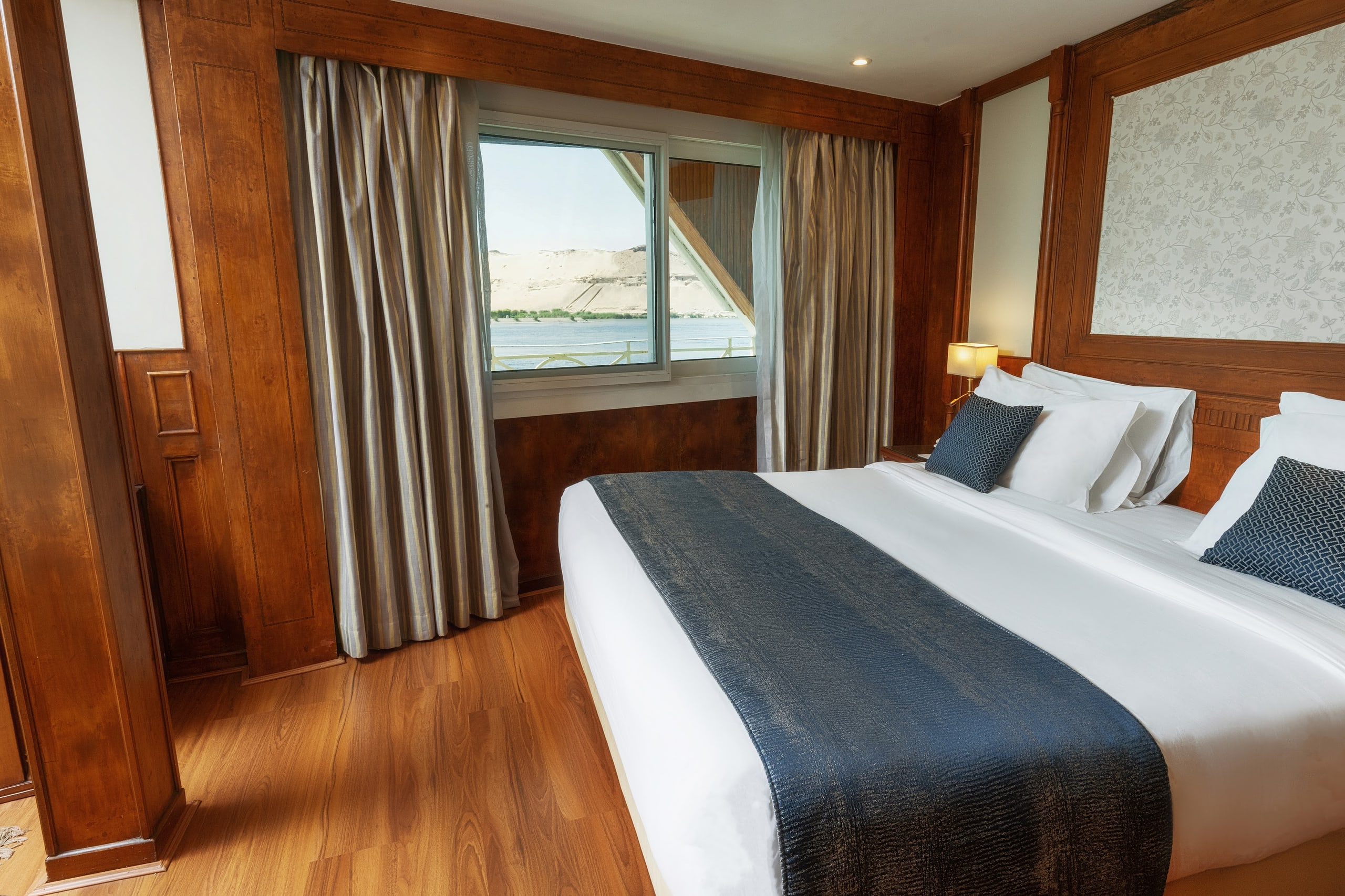 A panoramic suite with a river view