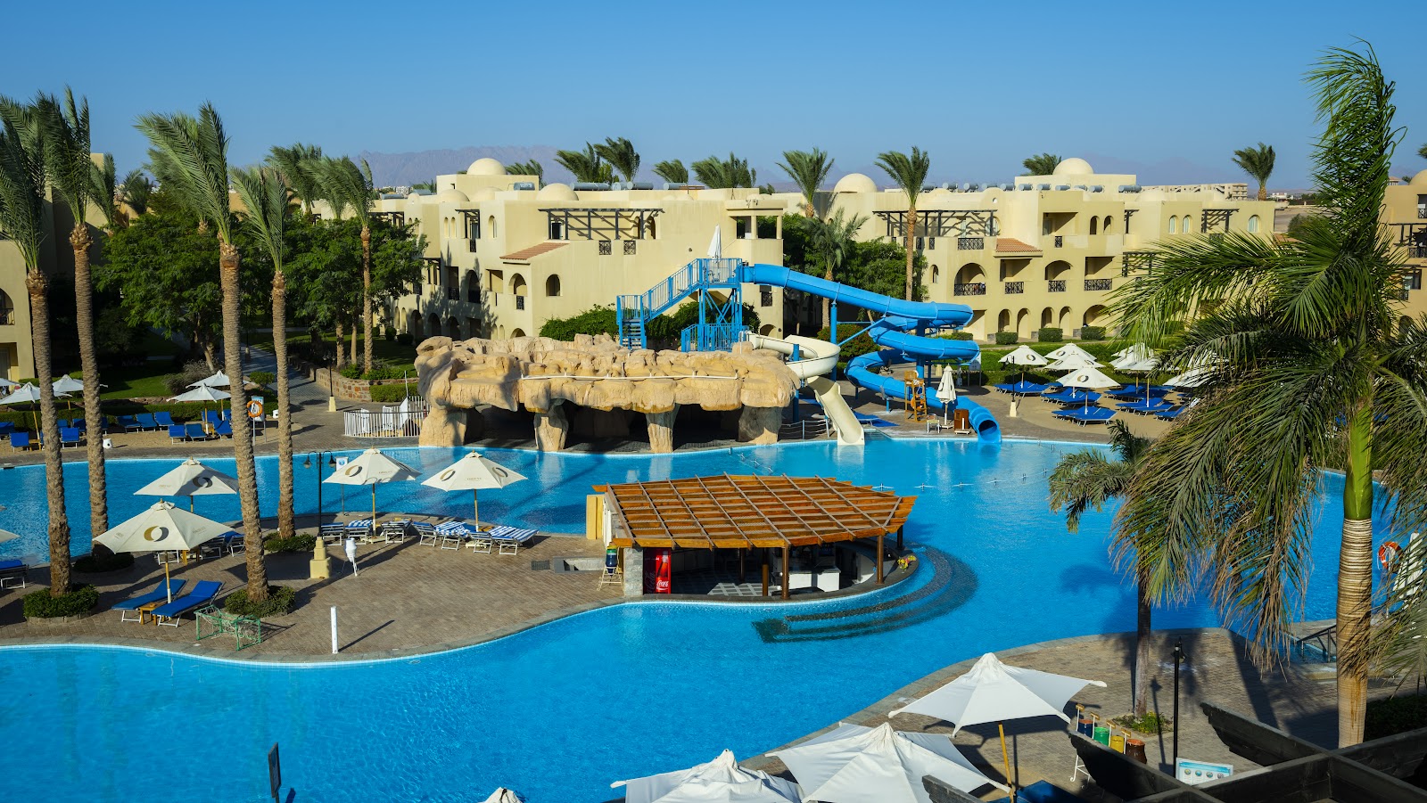 Golden-hour pool terrace overlooking the Red Sea